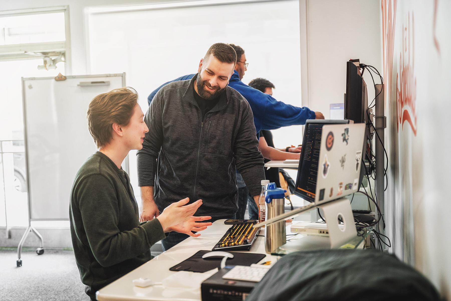 CoSchedule team members telling jokes